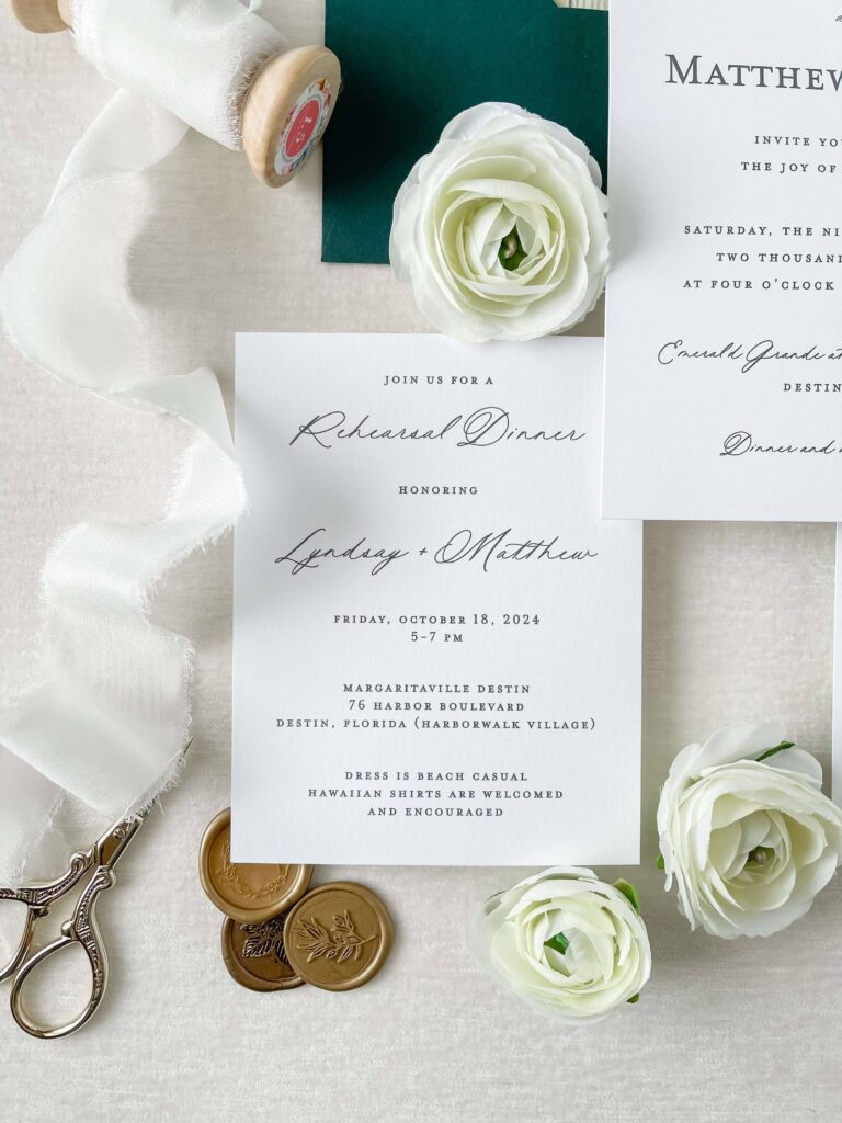 Wedding invitation card with rehearsal dinner information