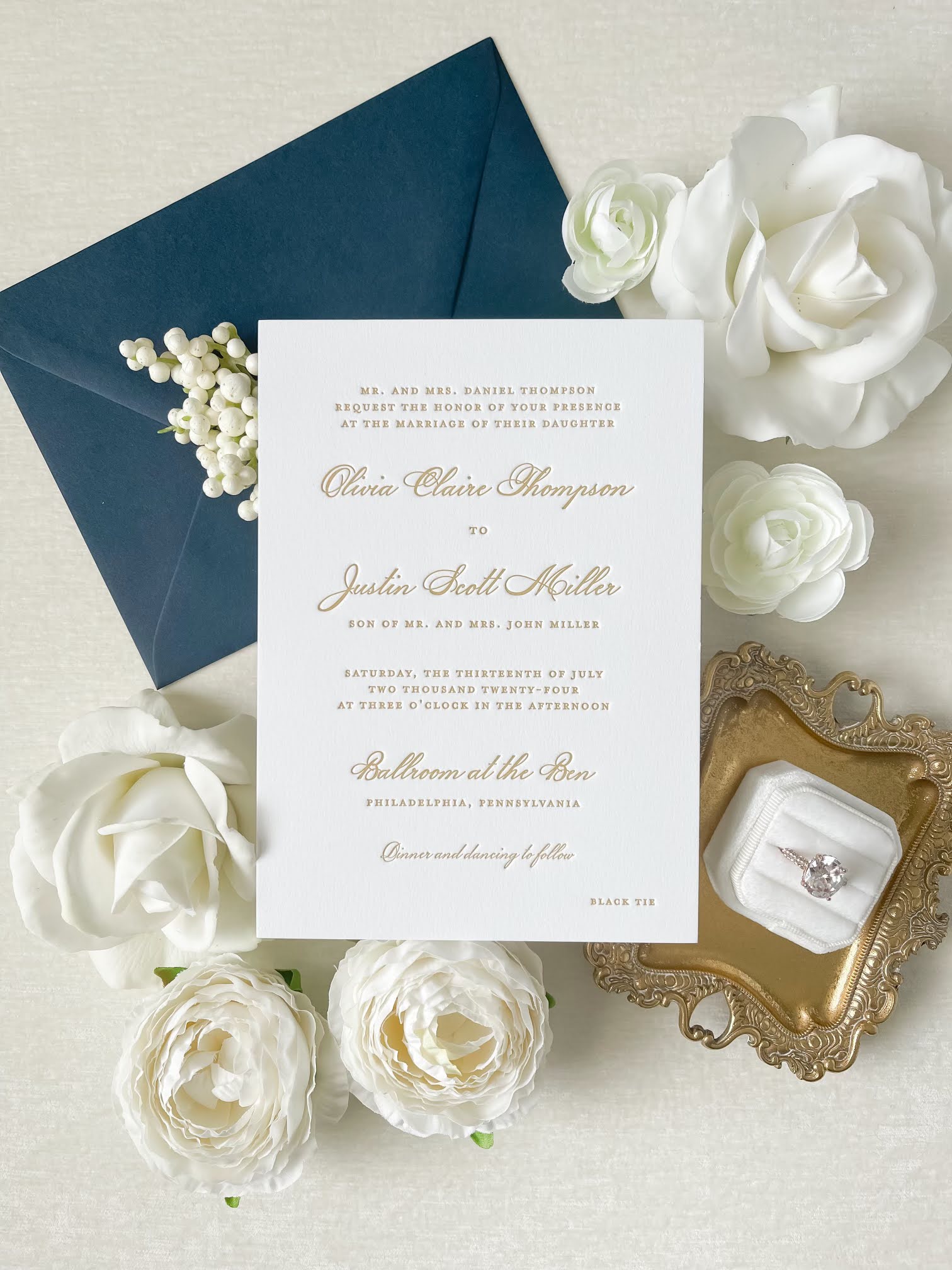 Wedding invitation with elegant gold letterpress printing