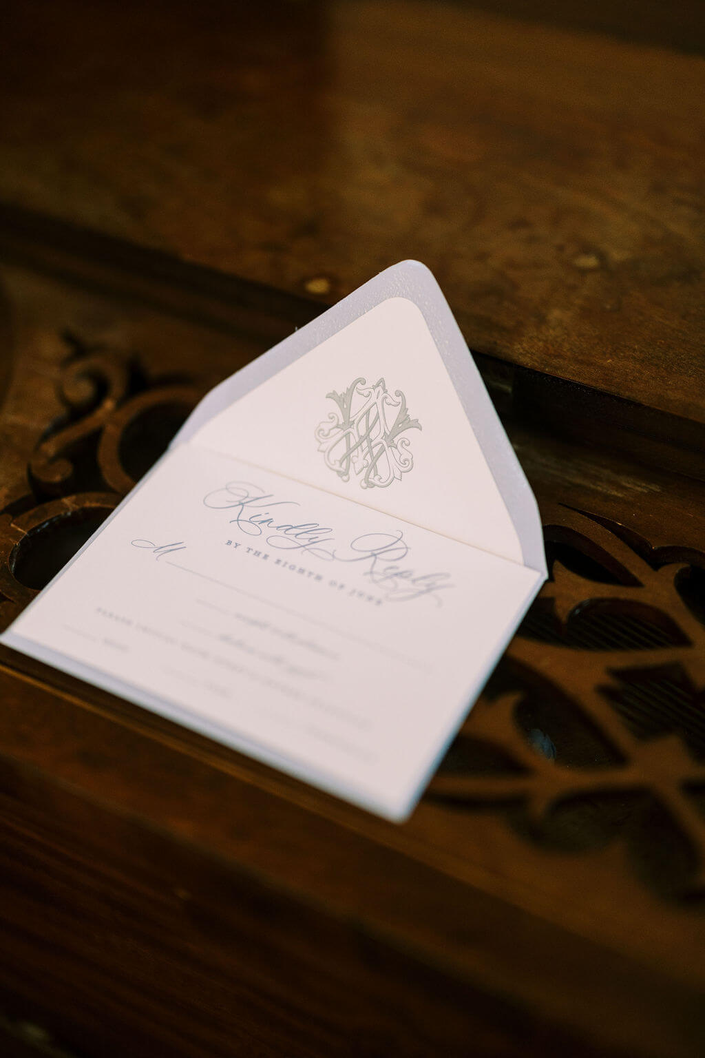 Custom wedding response card with an elegant monogram