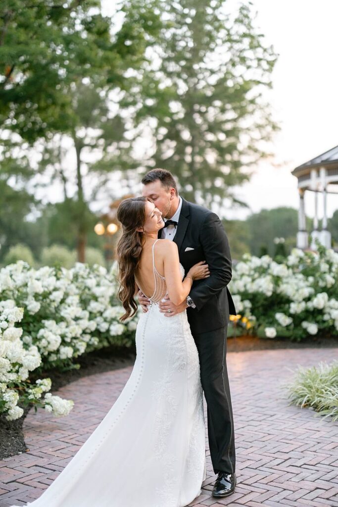 Outdoor garden portrait of a bride and groom