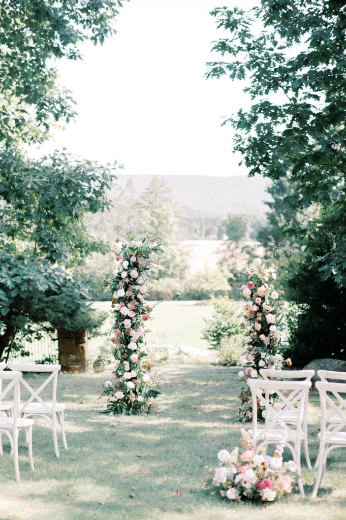 Wedding ceremony with floral arch