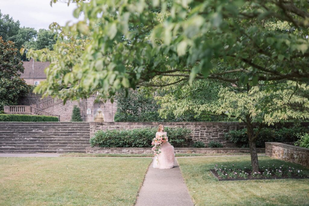 Bridesmaid exploring Tyler Gardens