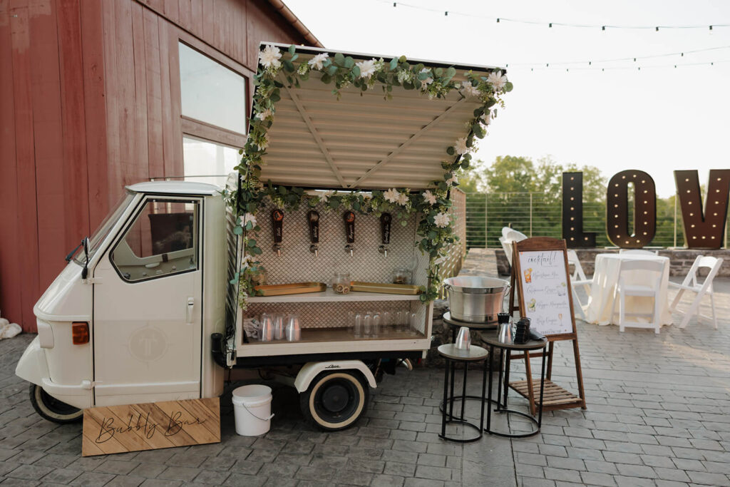 The Traveling Tap mobile bar truck parked on a patio ready to serve cocktails