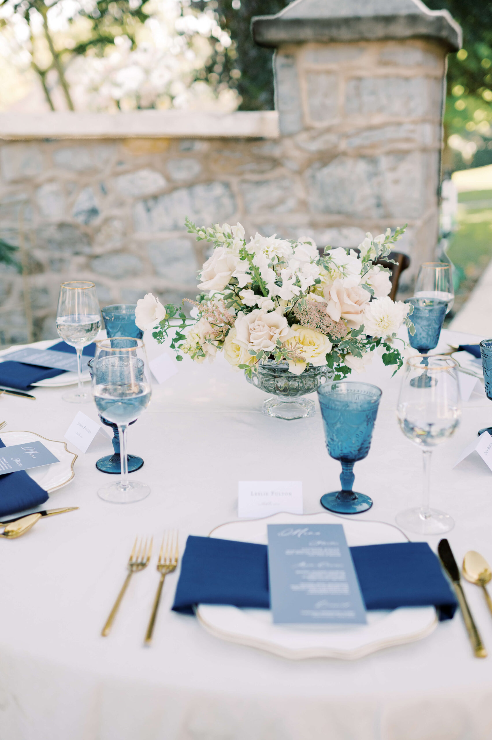 Pastel spring wedding reception floral arrangement