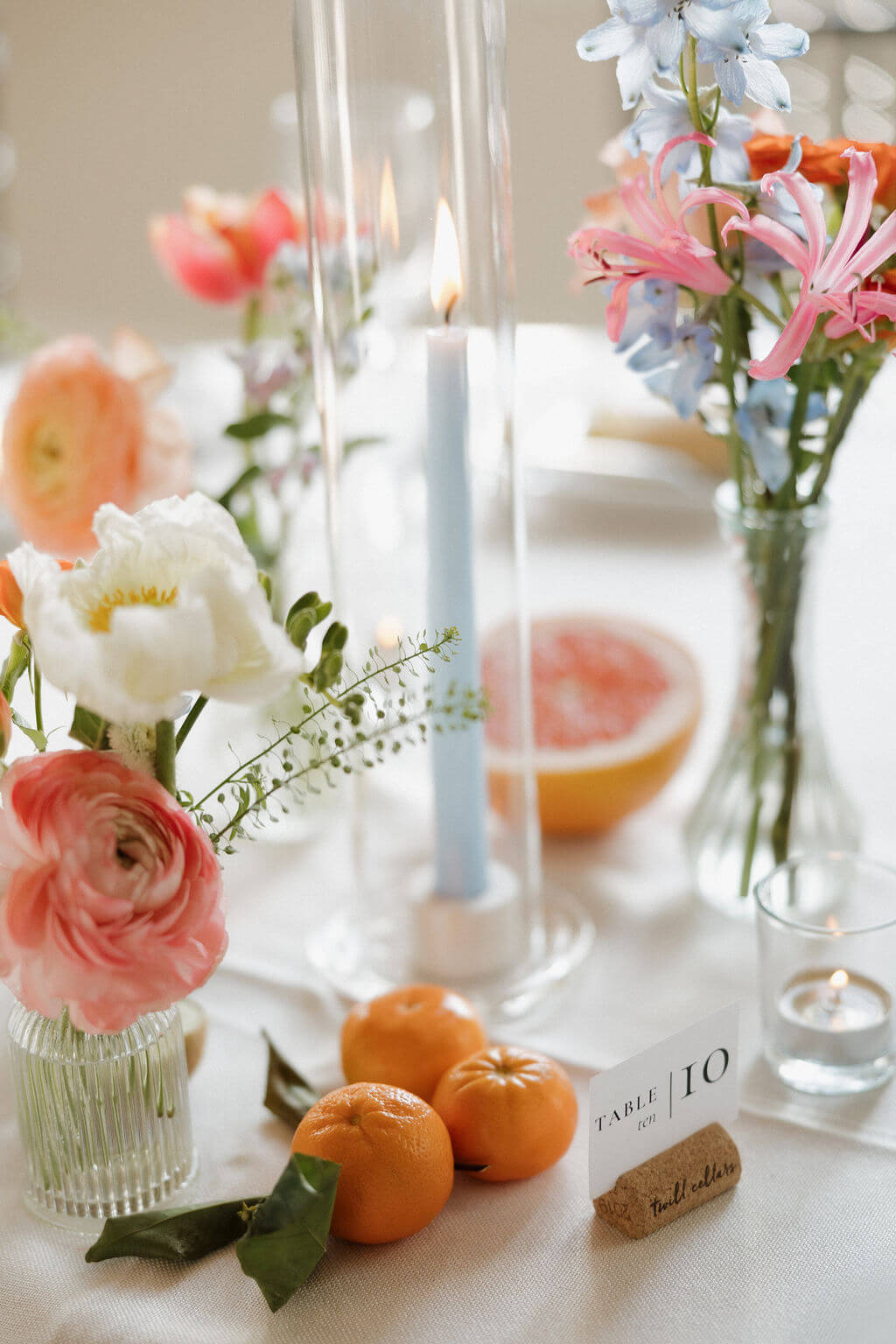 Vibrant floral arrangement at wedding reception table