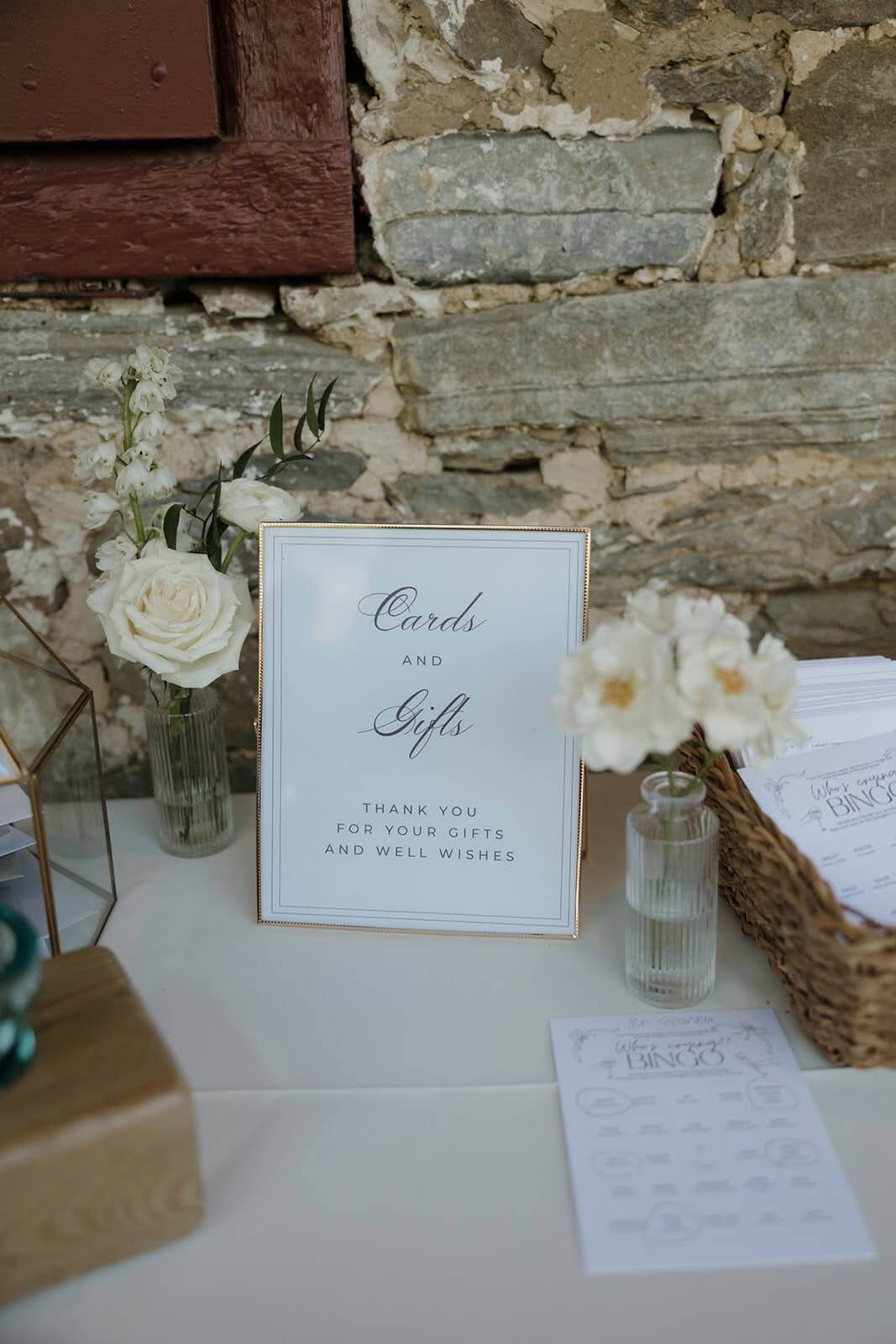 Elegant black and white cards and gifts sign in a gold frame