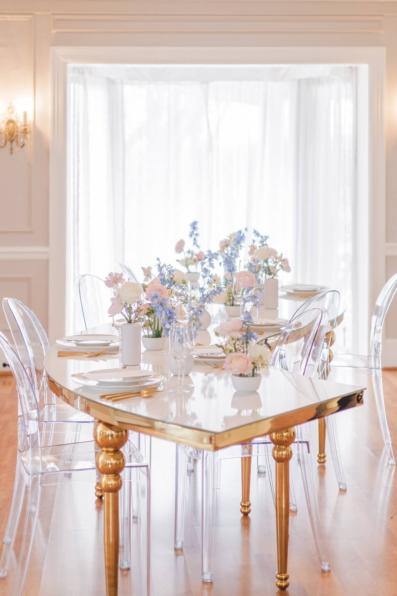 Elegant wedding reception tablescape with pastel spring flowers