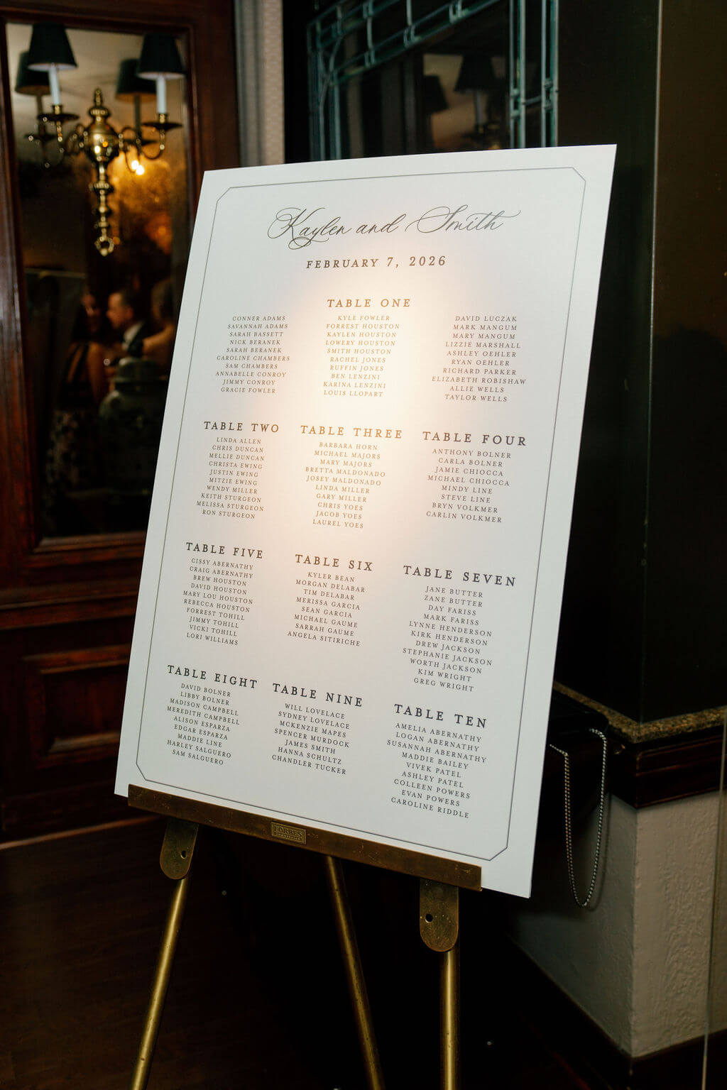 Alphabetical wedding seating chart display on an easel