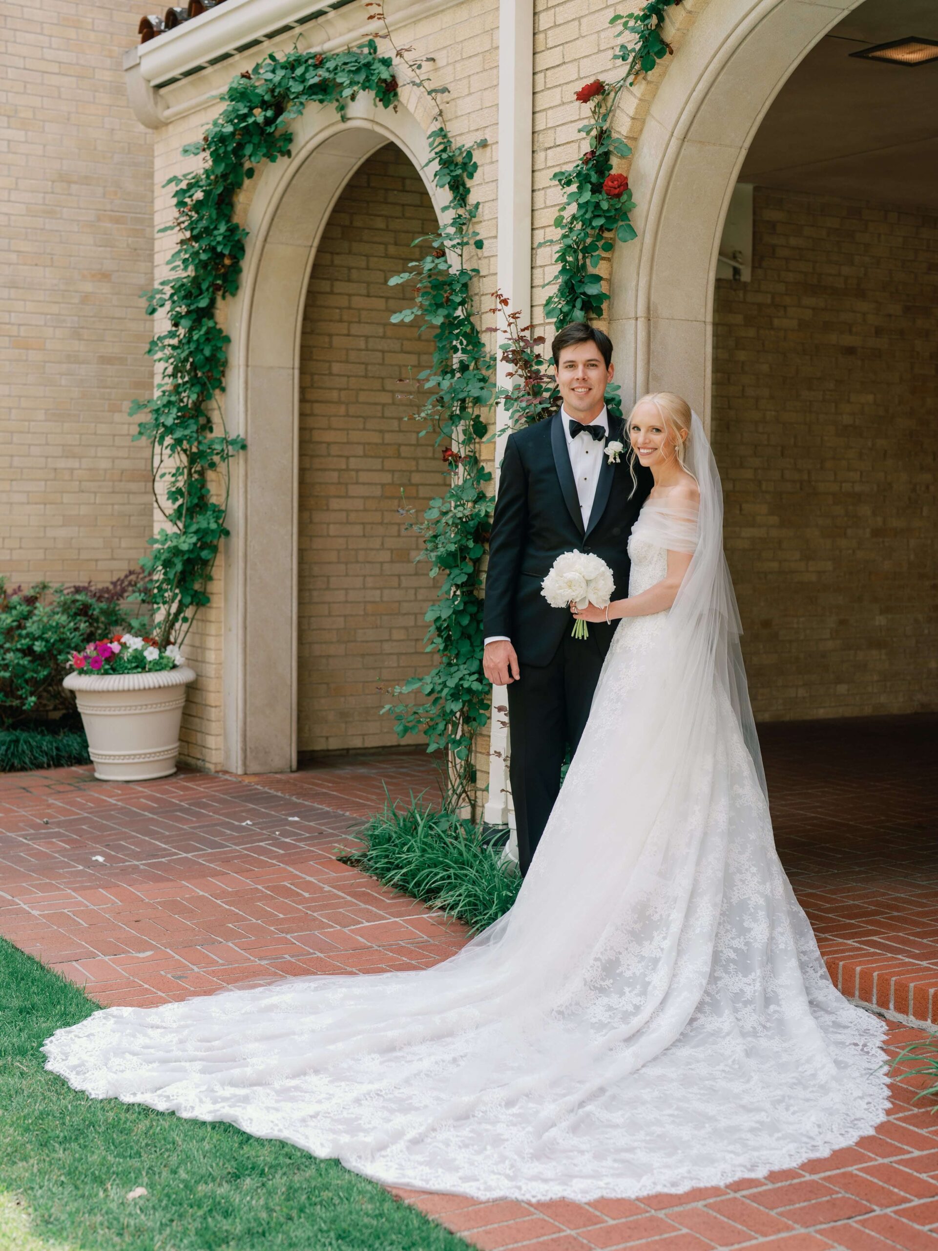 Bride and groom portrait in front of church