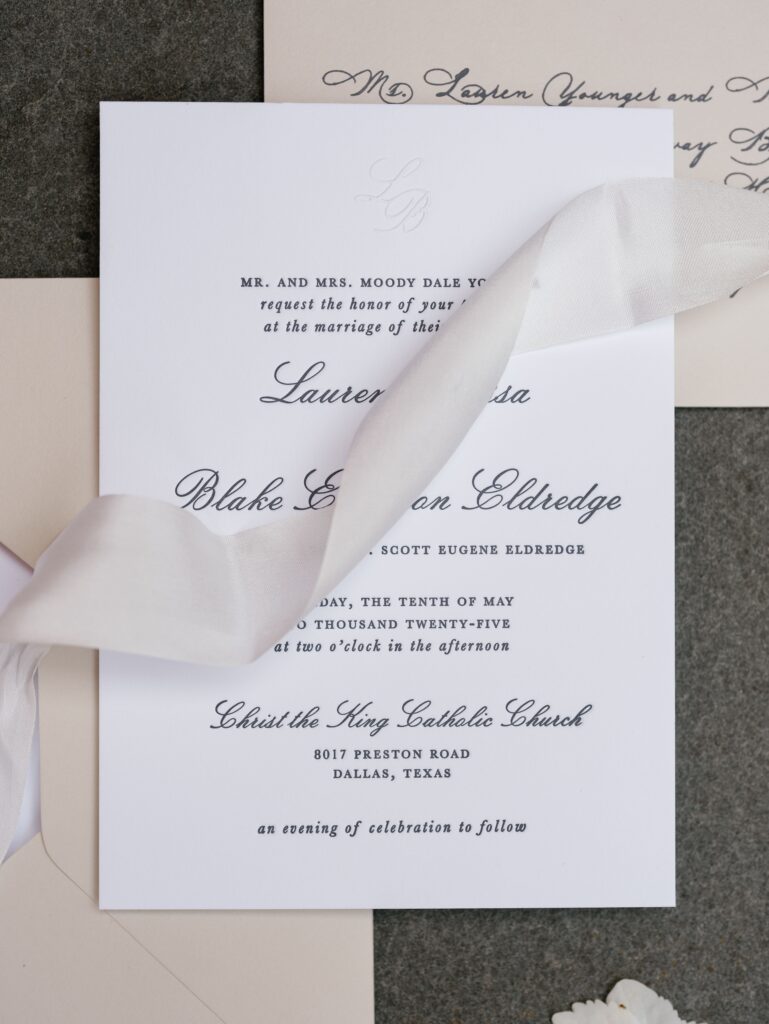 Classic letterpress wedding invitation with silk ribbon and blind embossing