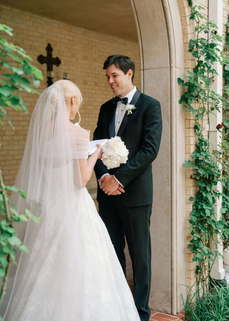 Bride reading private vows to groom