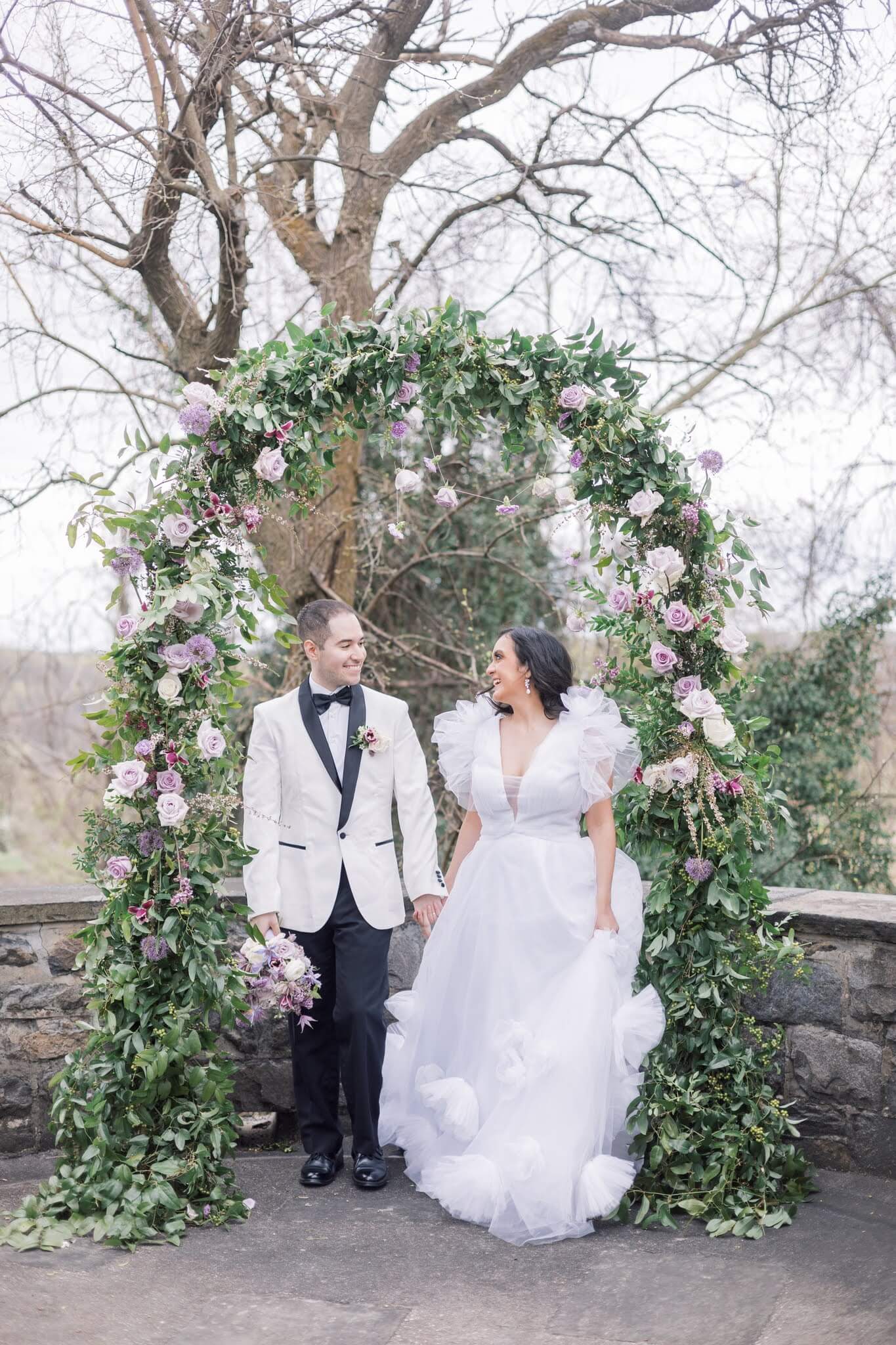 Lilac floral wedding ceremony arch