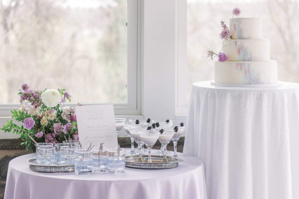 Wedding reception cake and bar display