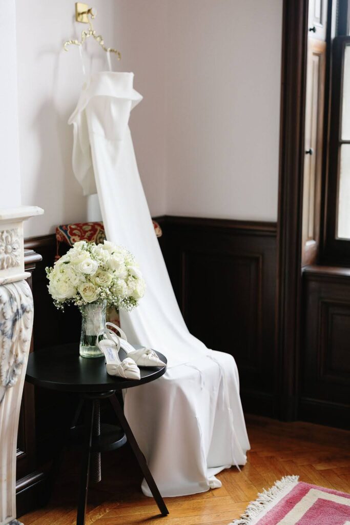 Bride's dress, bouquet, and wedding shoes