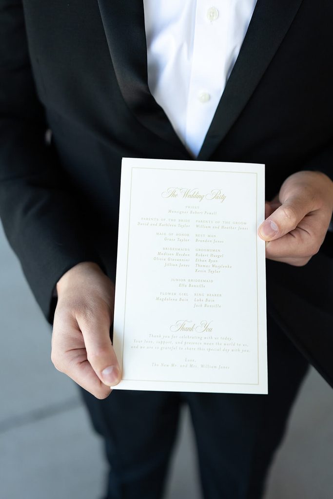 Back of a wedding ceremony program card with details about the wedding party and a thank you note