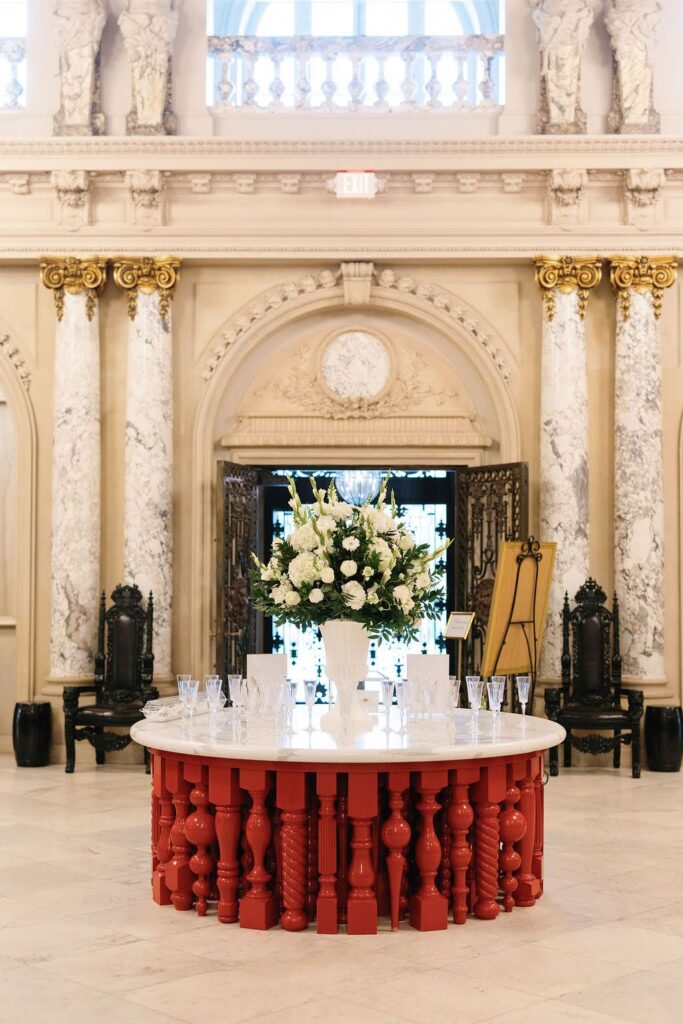 Wedding reception welcome table with champagne glasses