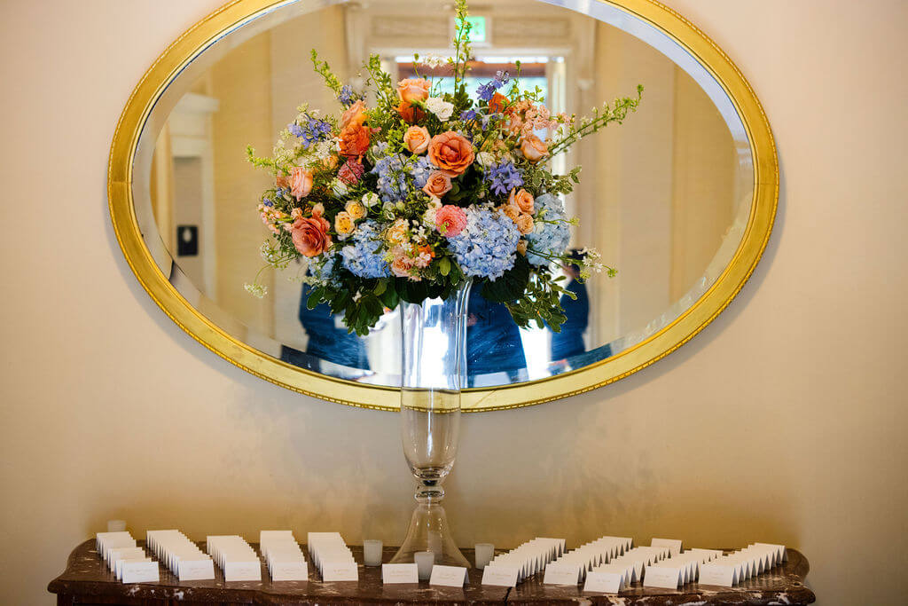 Tented escort cards on an elegant table at a reception at Glen Manor House