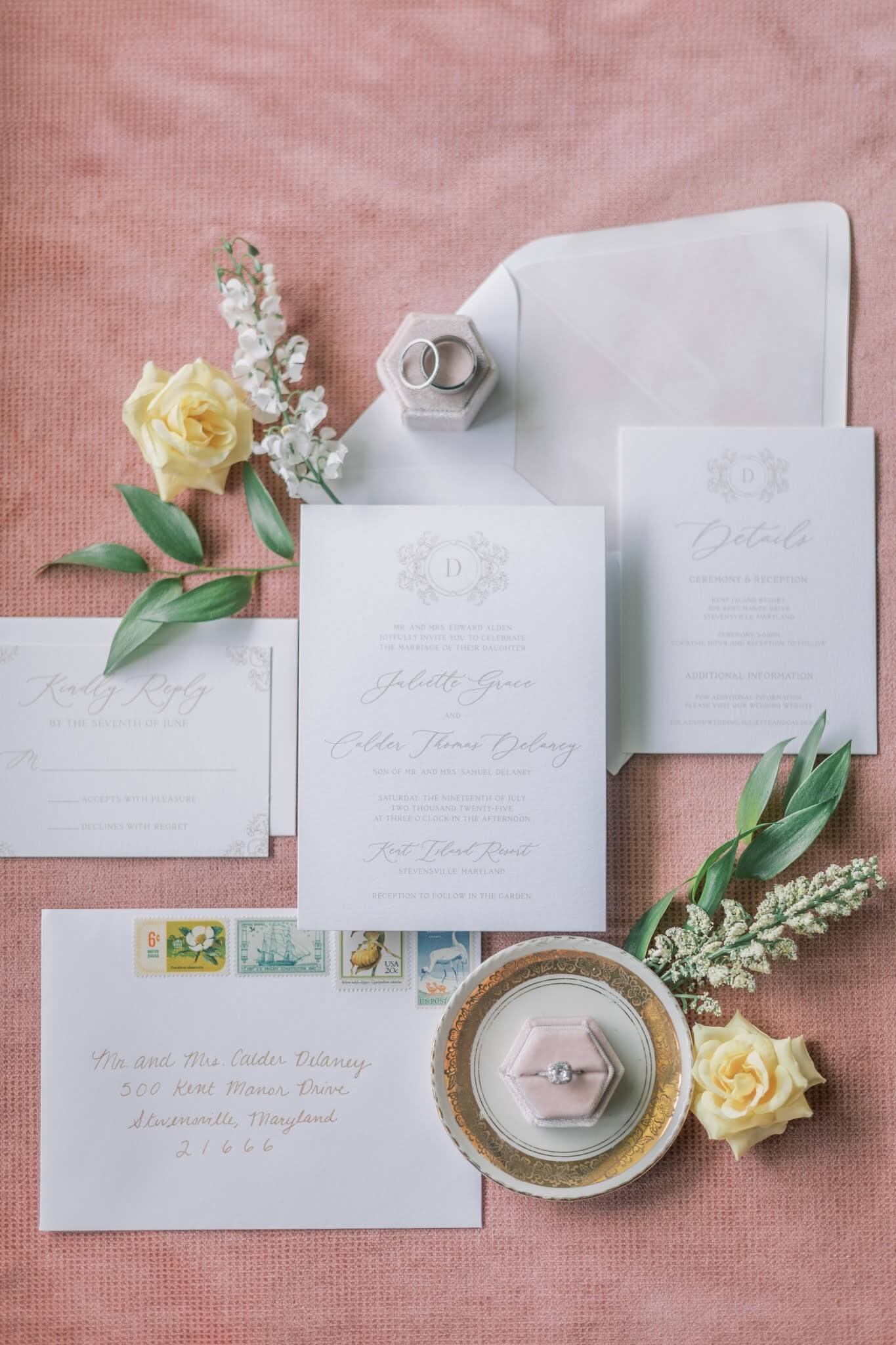 Elegant wedding invitation suite with custom floral monogram, details card, and response card