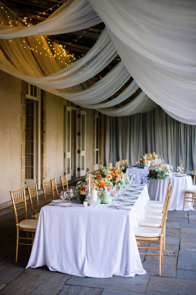 Outdoor wedding reception table for a colorful summer wedding at Glen Manor House