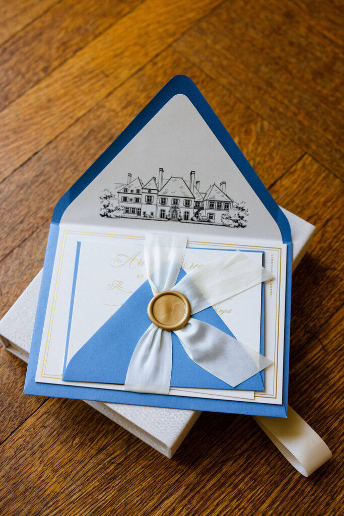 Wedding invitation suite featuring line art illustration of Glen Manor House in the envelope liner