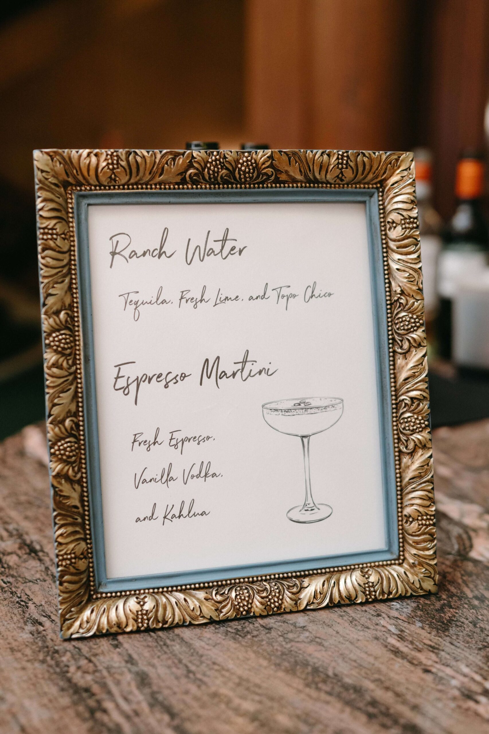 Signature drink sign with custom artwork in an elegant gold frame