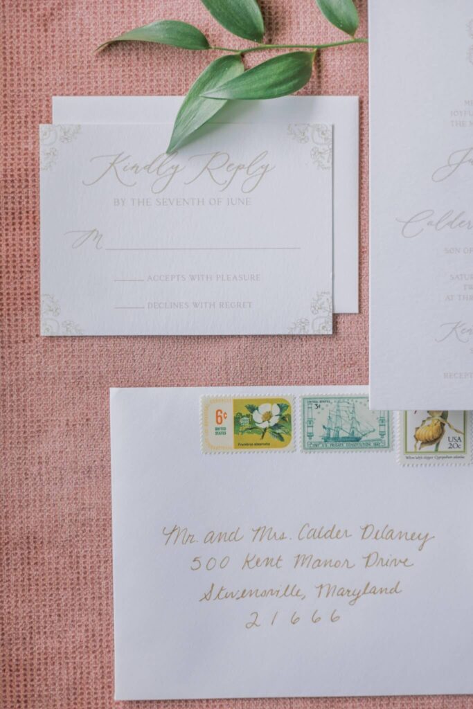 Elegant kindly reply wedding invitation card with floral details