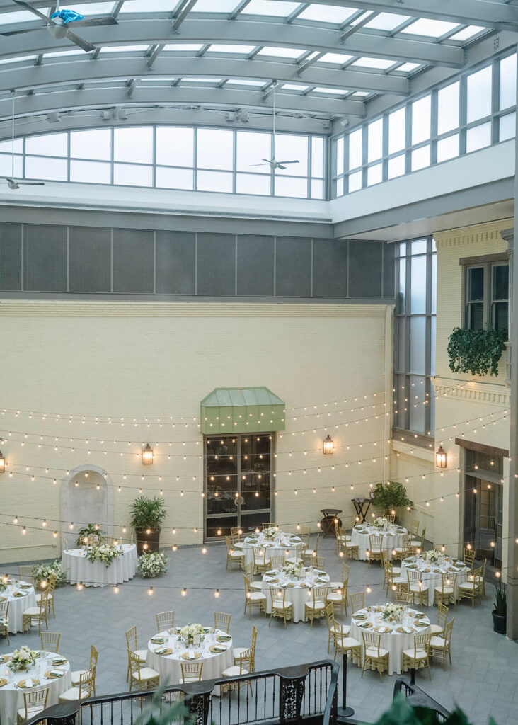 White and gold wedding reception tables at the Engineers Club in Baltimore, Maryland