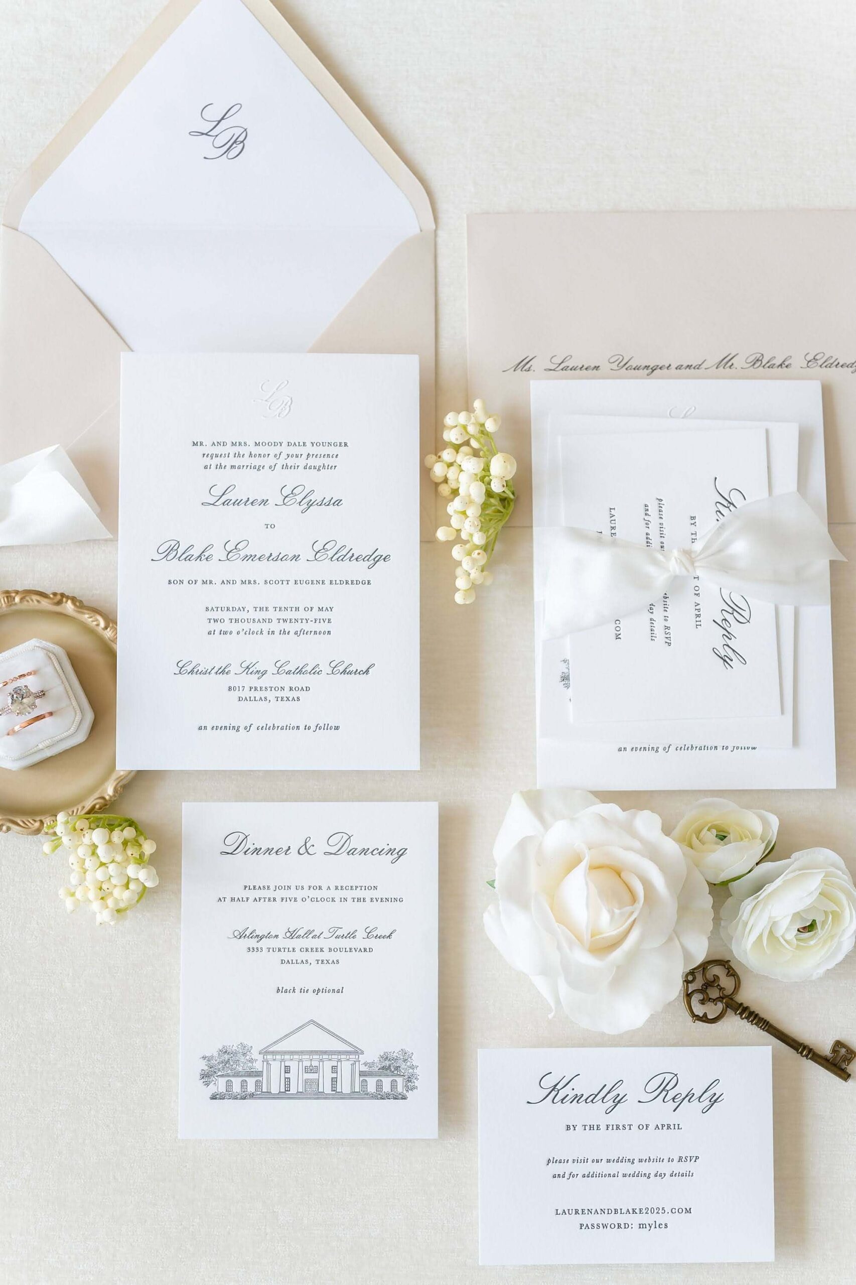 Classic black and white letterpress wedding invitations with blind embossed monogram, tan envelope, and venue illustration