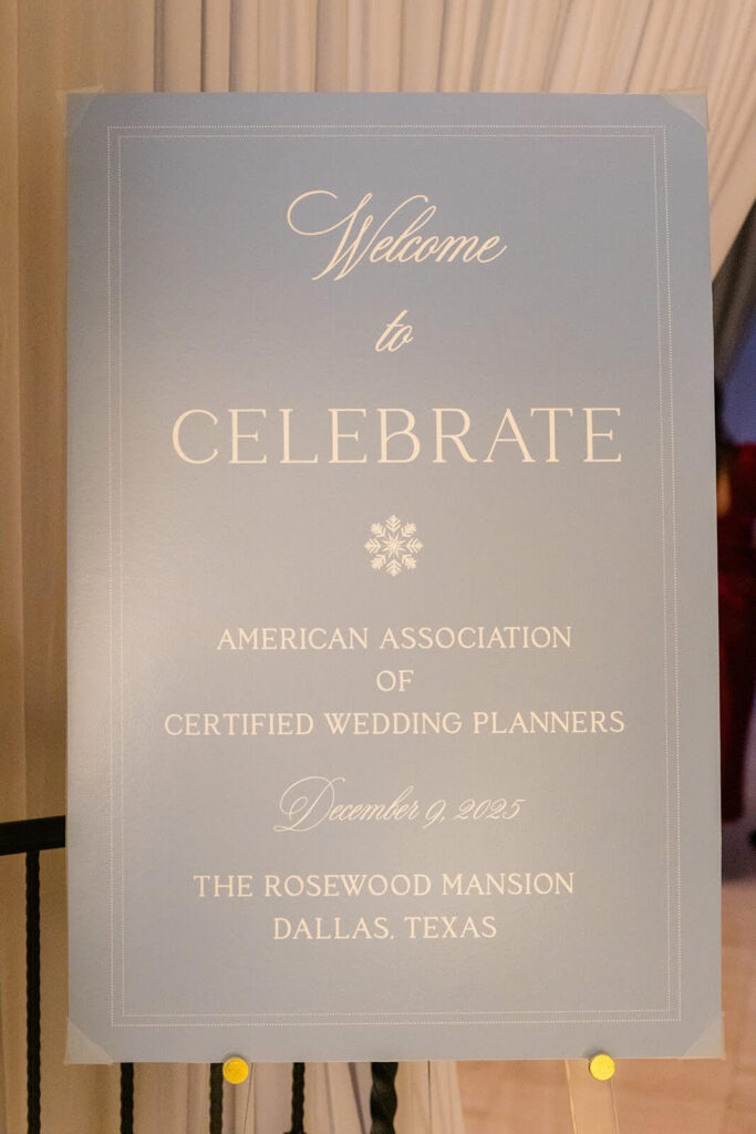 Light blue winter gala welcome sign for the AACWP holiday party
