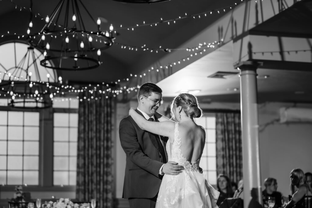 Bride and groom share their first dance at their wedding reception at the Joseph Ambler Inn
