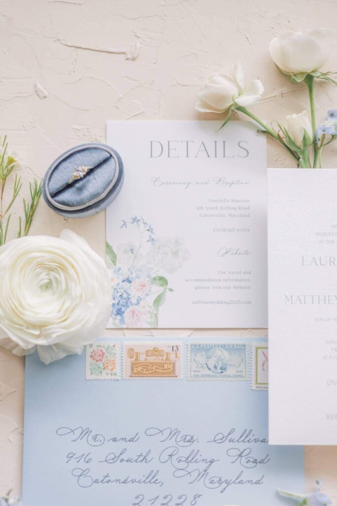 Romantic wedding invitation details card with floral watercolor artwork