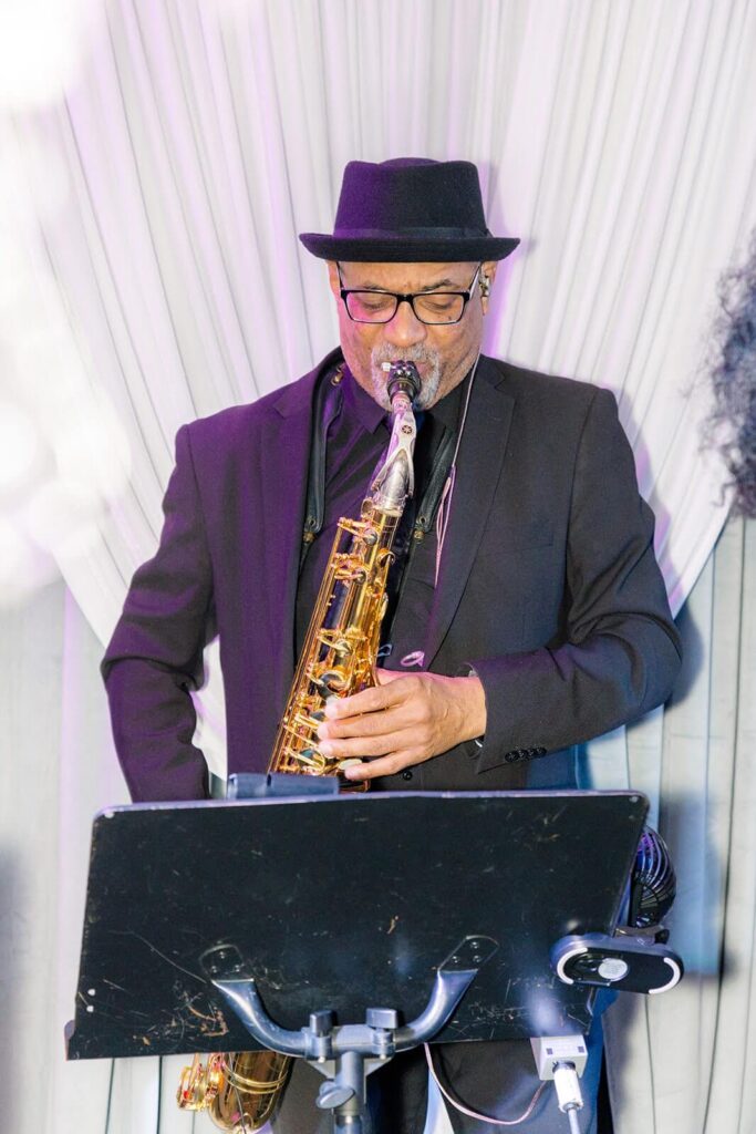 Saxophonist Marquise Jones playing the saxophone
