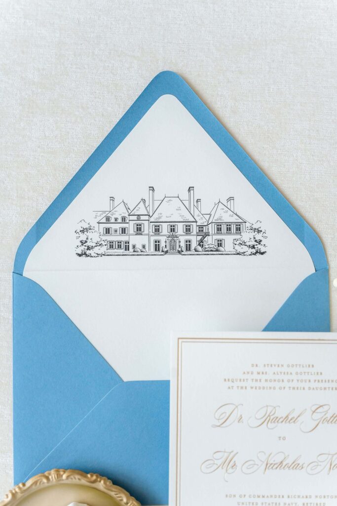 Blue envelope with a venue illustration envelope liner of Glen Manor House