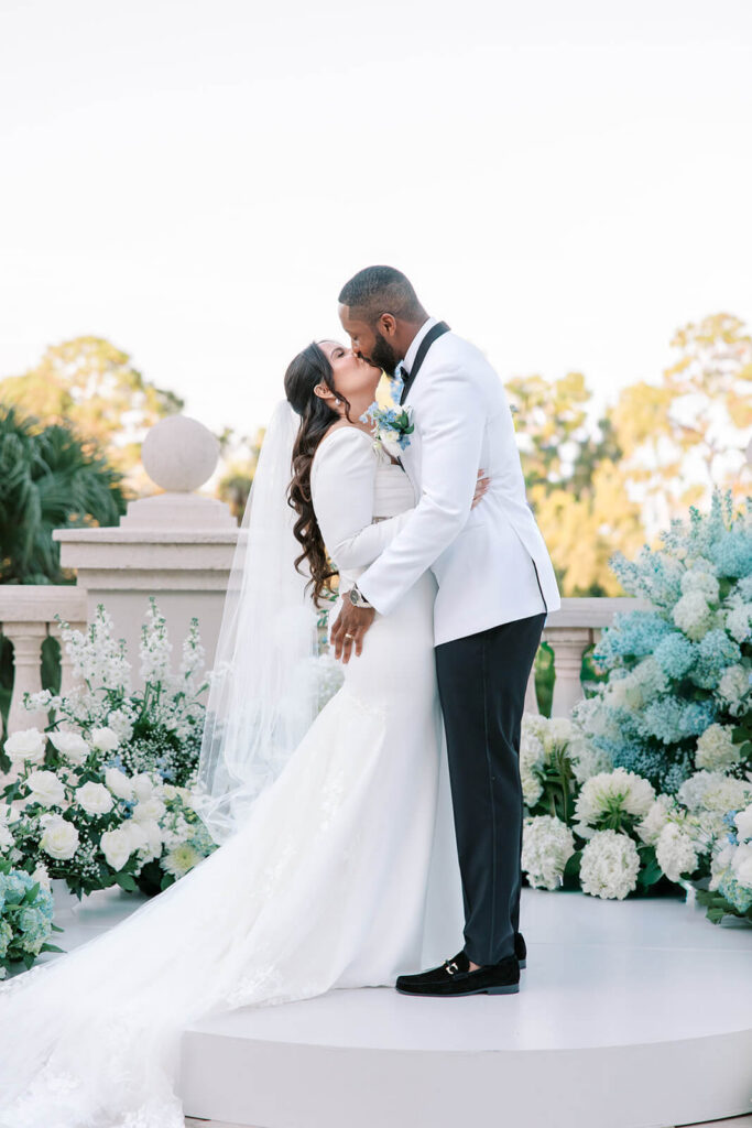 Bride and groom first kiss