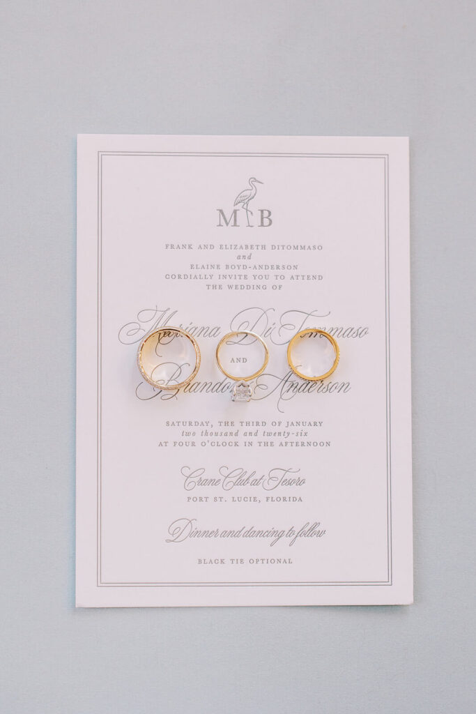 Classic wedding invitation card with custom crane monogram