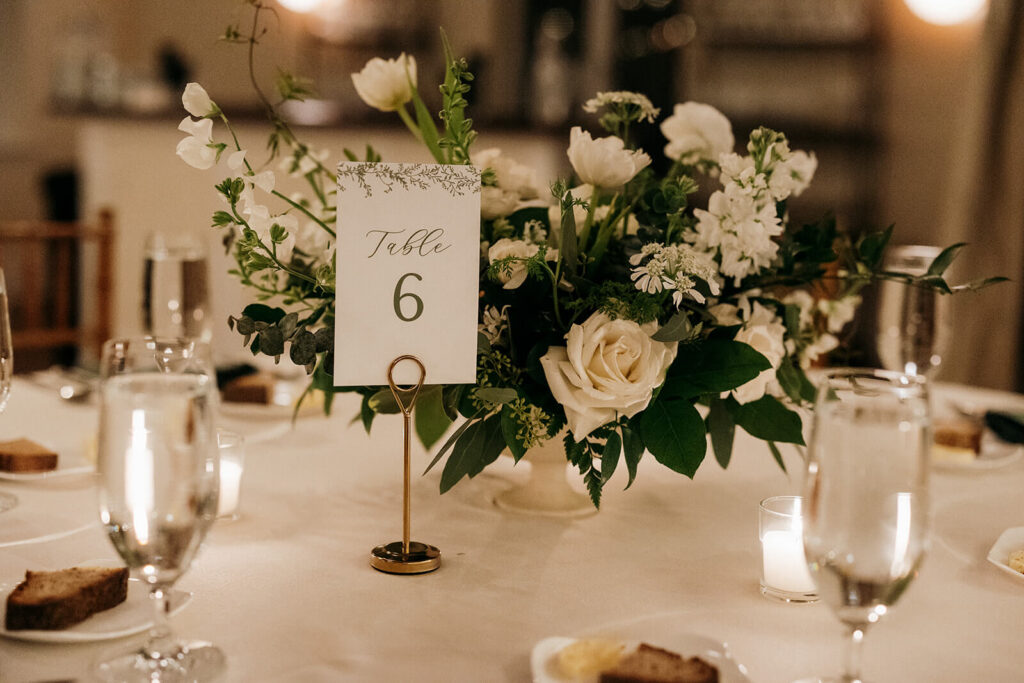 Elegant wedding table number card with gold stand