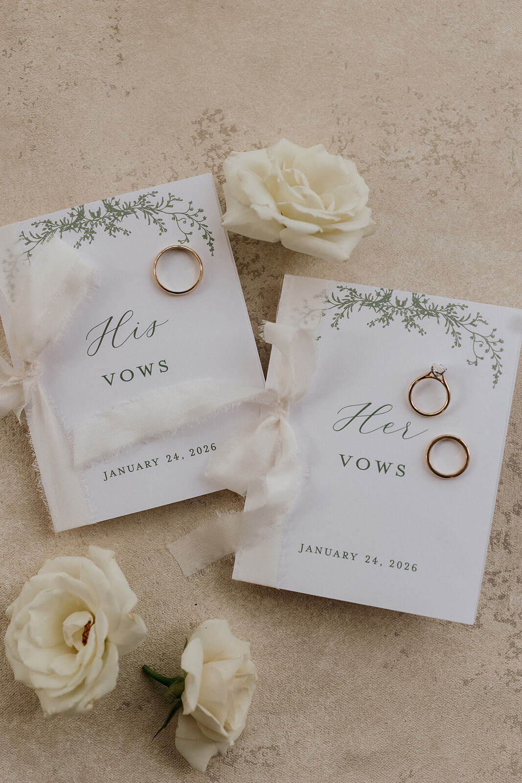 His and Hers wedding vow books with greenery design