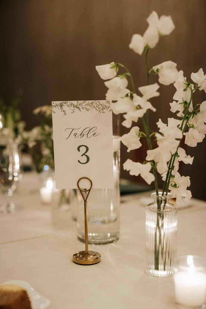 Elegant wedding table number card with gold stand