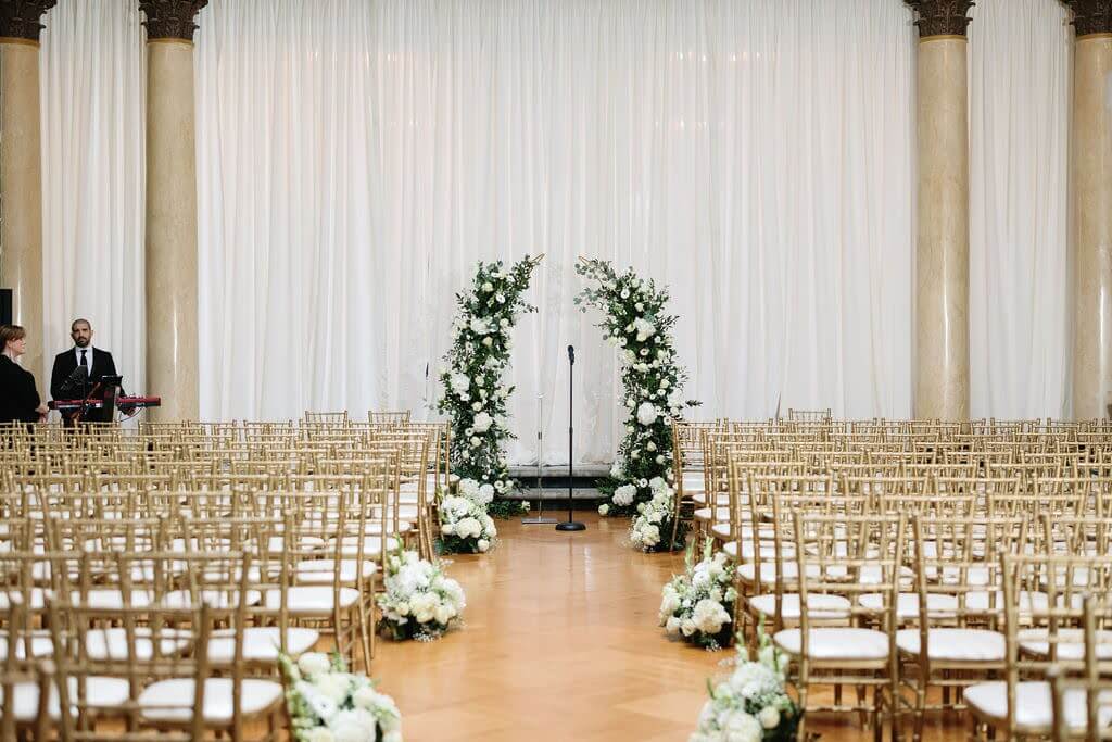 Indoor wedding ceremony at Elstowe Manor at Elkins Estate
