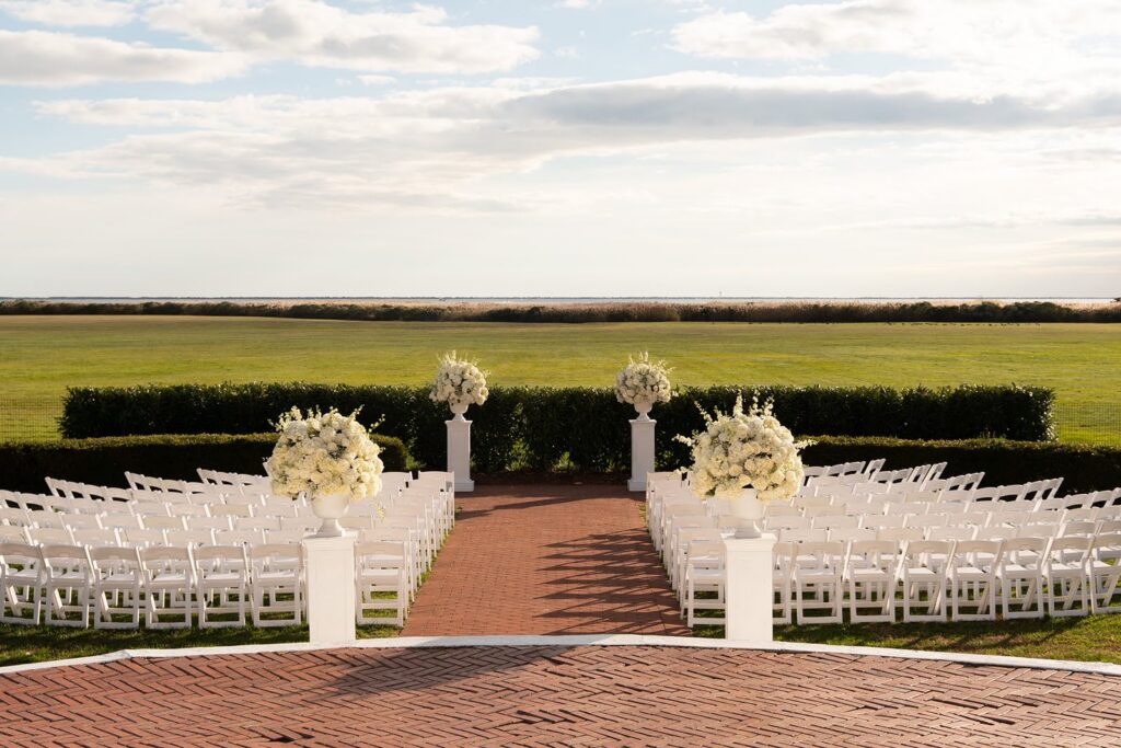 Bourne Mansion wedding ceremony setup during golden hour