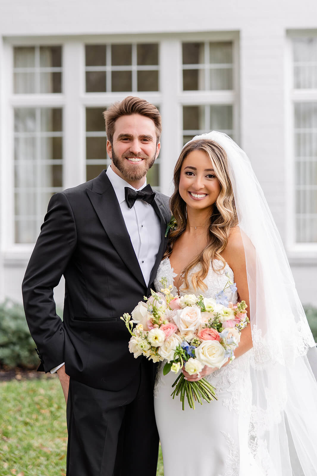 Elegant portrait of bride and groom on  their wedding day at Adams Estate