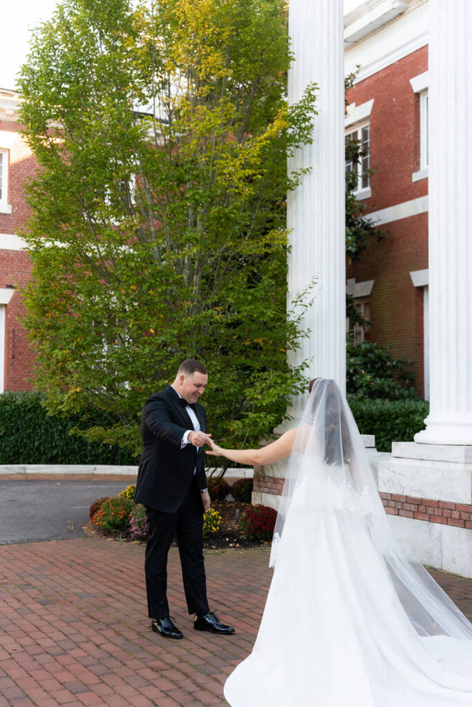 Groom's first look at bride on their wedding day