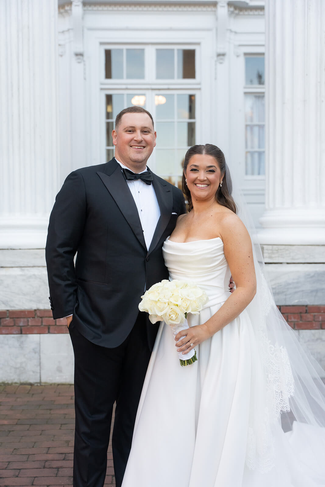 Portrait of bride and groom at their Bourne Mansion wedding