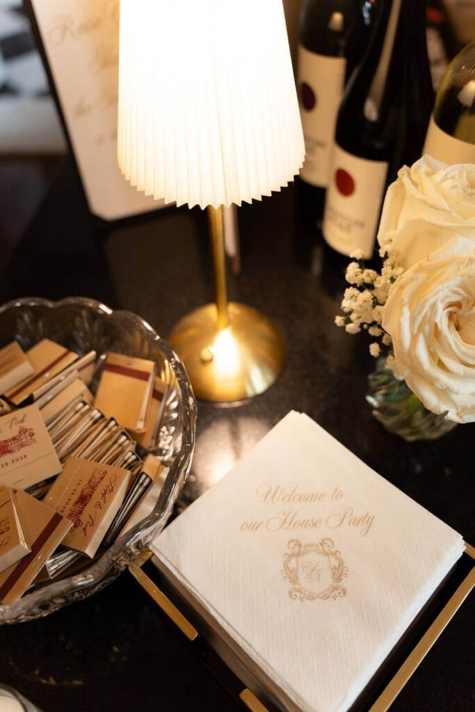 Wedding cocktail napkins that read "Welcome to our House Party"
