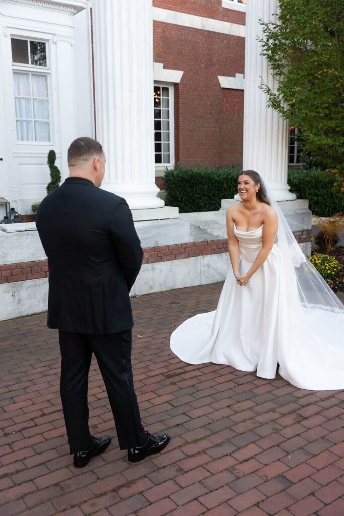 Groom's first look at bride on their wedding day