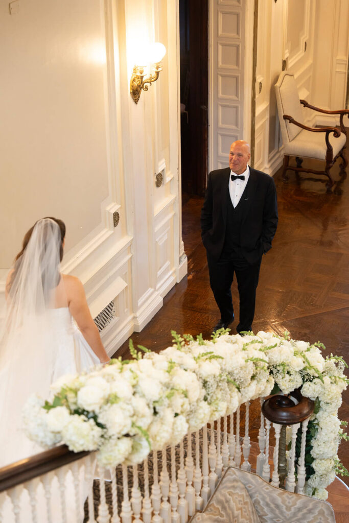 First look between father and daughter on her wedding day