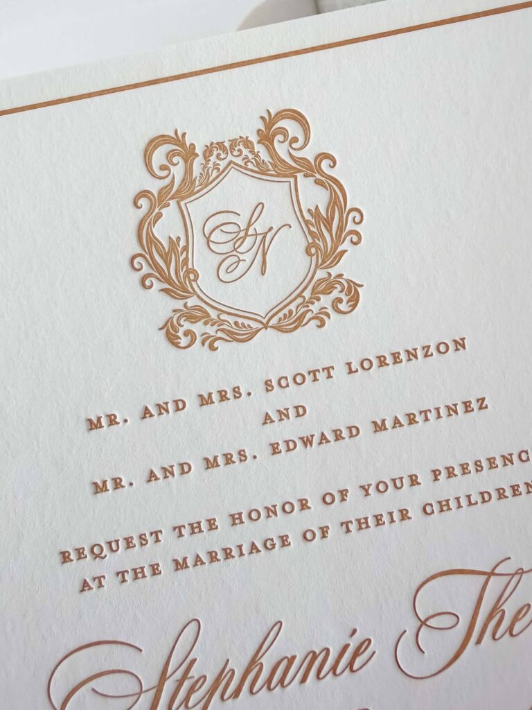 Formal gold letterpress wedding invitation crest