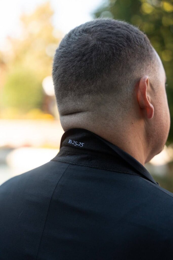 Custom embroidery of the wedding date on the groom's tux