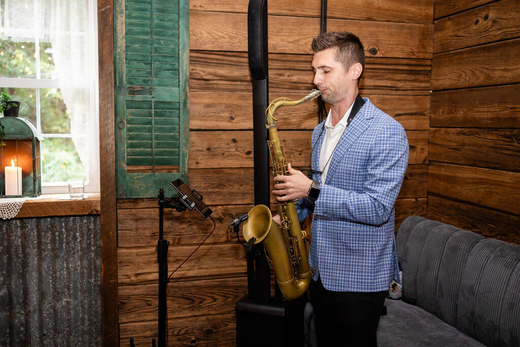 Solo saxophonist playing for a wedding reception