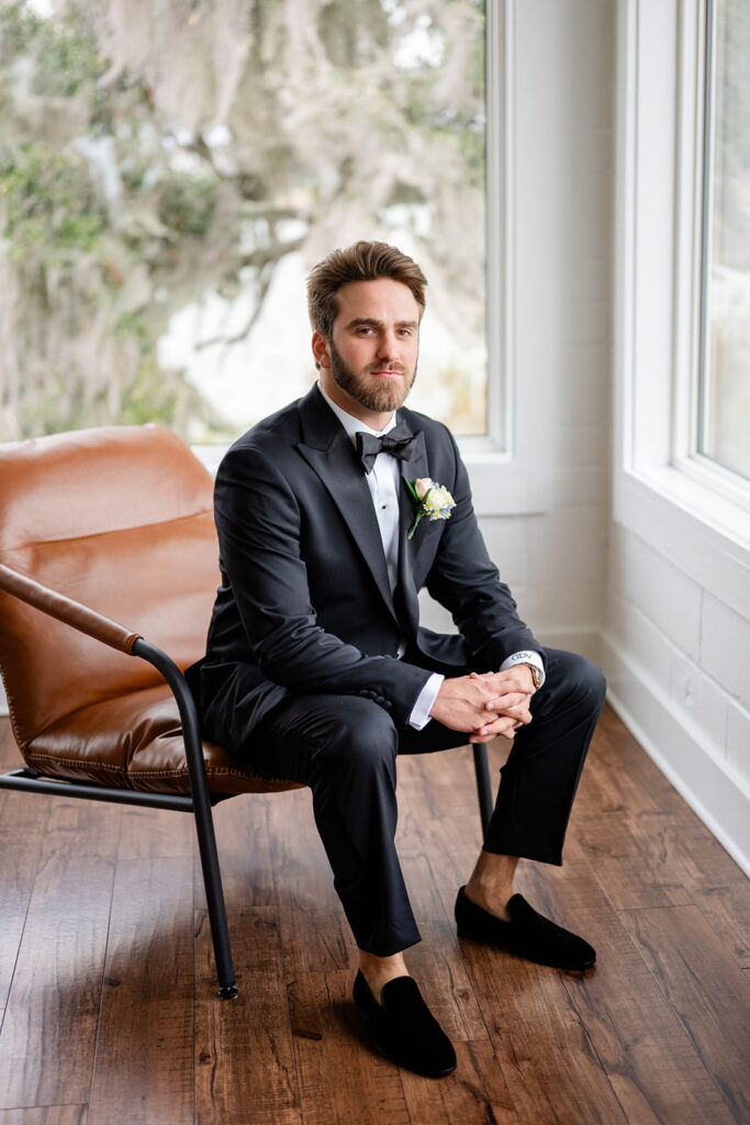 Elegant portrait of groom on wedding day